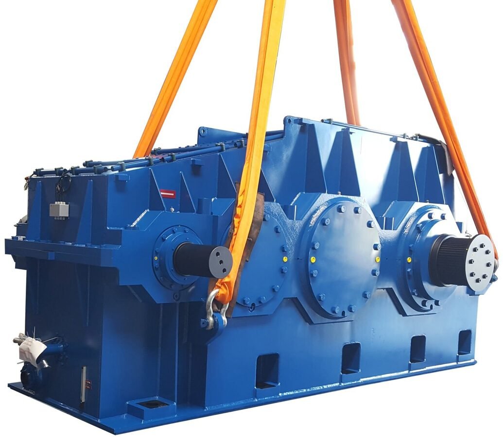 Industrial gearbox gear set assembled at Parkash Gears - helical gears and pinion shaft inside a gearbox housing